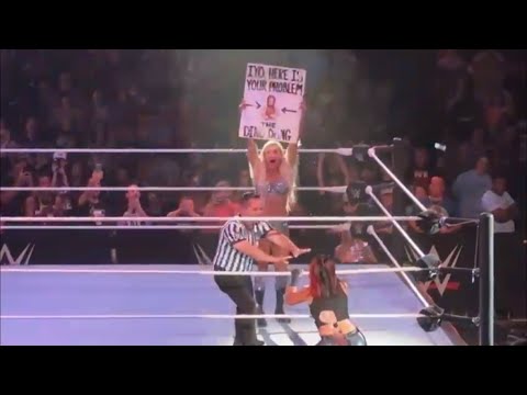 Charlotte Flair trolls Bayley with fans sign during WWE Live Event!!