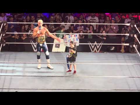 Cody Rhodes surprises a little girl with his weight belt during WWE live Summer Tour event!